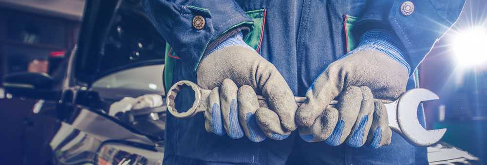 Technician holding spanner - Norwood Green MOT & Service Centre